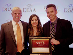 Photo showing staff accepting BOW award.