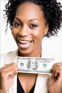 woman holding money and smiling