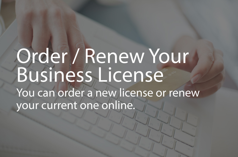 Photo showing a laptop with a credit card. Caption: Order / Renew Your Business License. You can order a new license or renew your current one online.